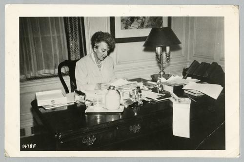 Mary Roberts Rinehart working at desk
