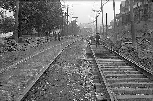Men on Railroad Tracks