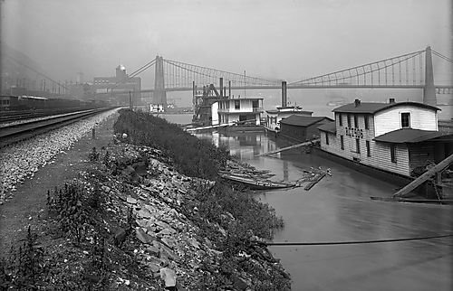 Tugboats on Riverbank