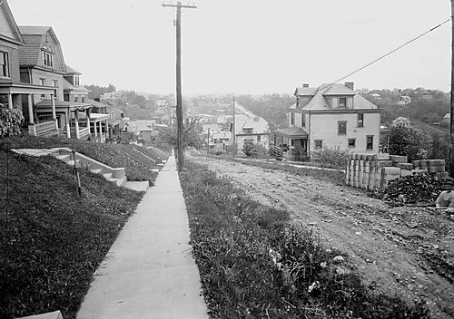 Man Working on Rossmore Avenue