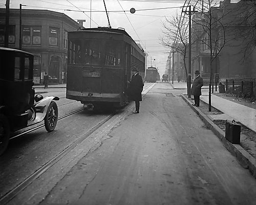 Man Boarding the Highland Park Streetcar