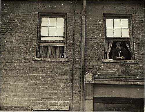 (Neighborhoods: Woman Looking out Window)