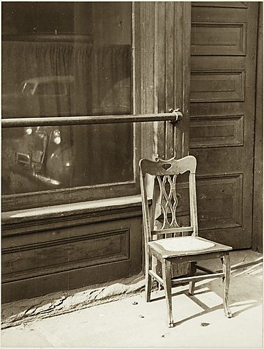 (Neighborhoods: Chair on Sidewalk)
