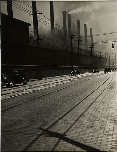 [Automobiles, Cobblestone Street and Steel Mill]