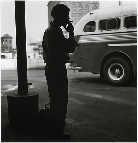 (Miscellaneous: Man Waiting for a Bus at Terminal)