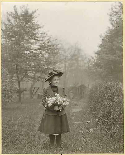 Ethel Holding Flowers
