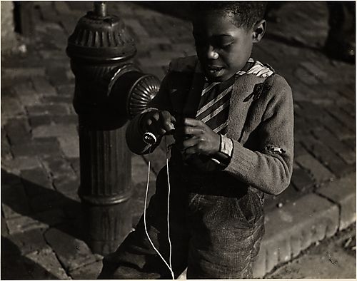 (Child Playing next to a Fire Hydrant)
