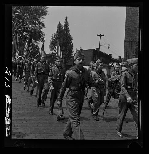 Uniformed Boys Marching in the Street