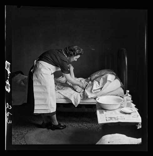 Nurse Caring for Older Person