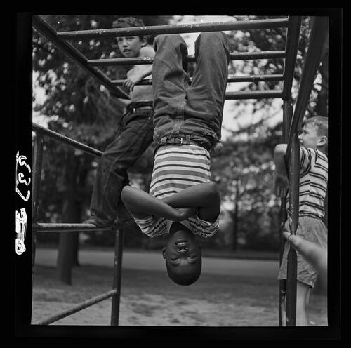 Child Hanging Upside Down