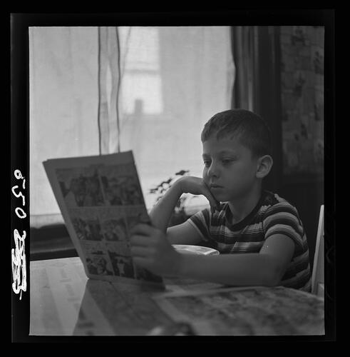 Jackie Solomon Reading Comic Book