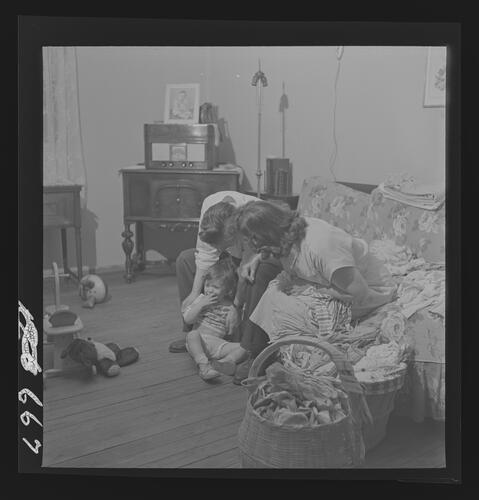 Family Sitting on Couch