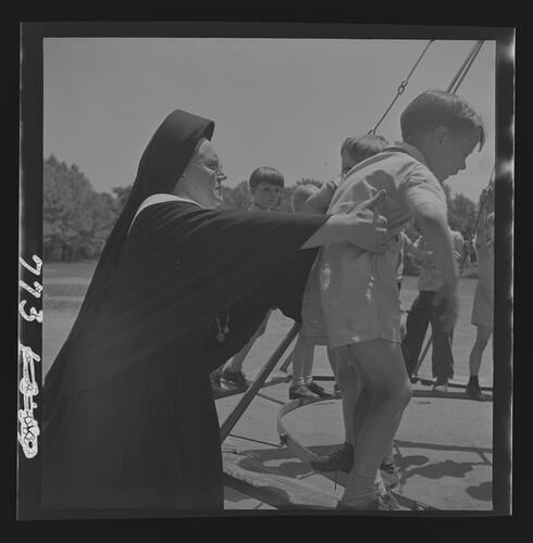 Nun and Children at Recess