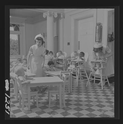 Children and Nurses during Mealtime