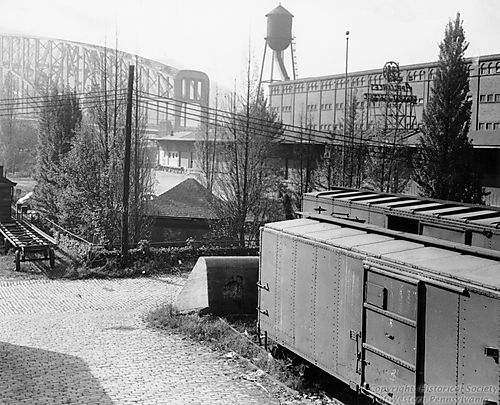 Fort Pitt Blockhouse with the Pennsylvania Railroad Warehouse and Freight Station
