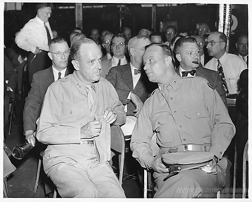 Army Inspectors chat at a meeting during their inspection of the McKeesport Works
