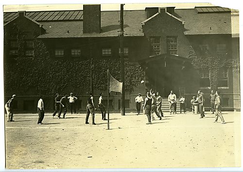 Men playing volleyball in Washington Park