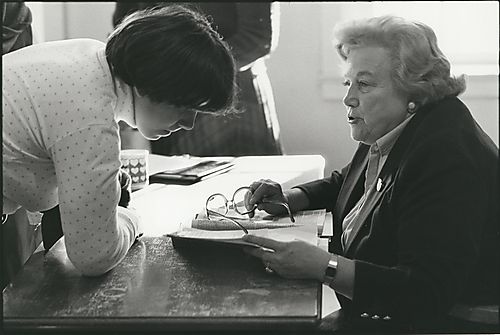 Former congresswoman Catherine Bedell meets with a student