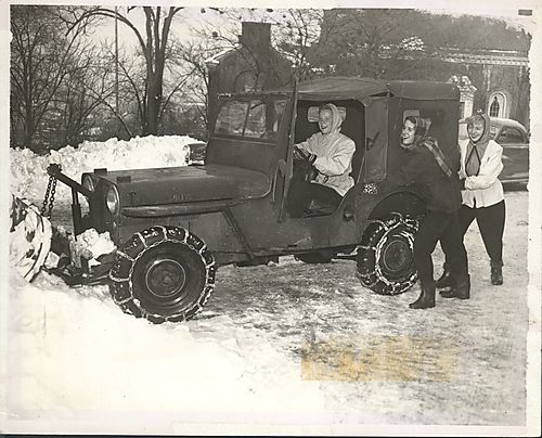 Students Plowing Snow with Jeep