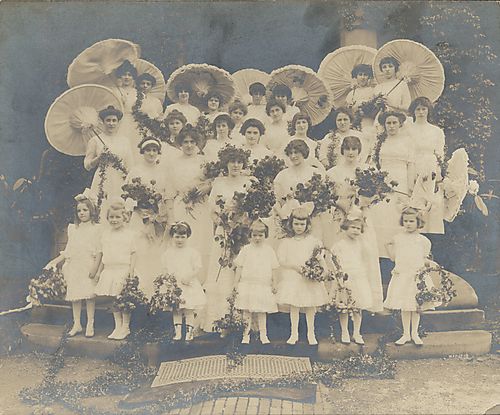 May Queen poses with her court