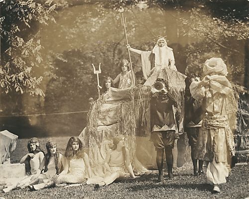 May Day scene with Neptune and a magician