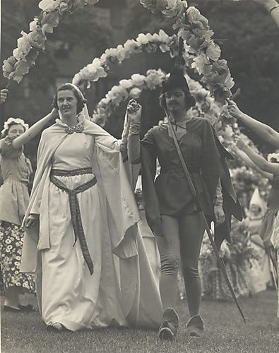 Robin Hood escorts Maid Marian