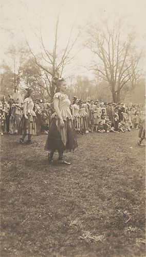 Snapshot of May Day dancer on the college lawn