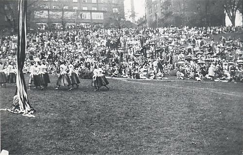 Snapshot of audience and maypole dance