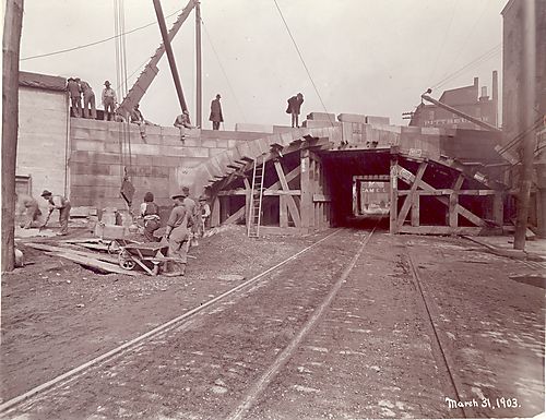 Incomplete bridge lower view- with worker